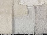 many different types of laces on a black surface