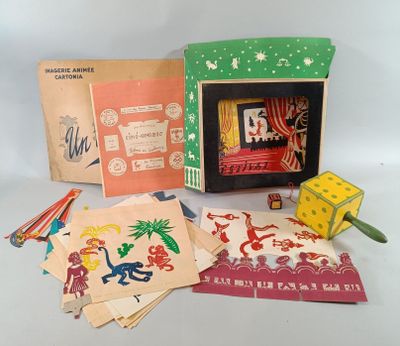 une image représentant un ensemble de jouets pour enfants, comprenant notamment un téléviseur et une boîte