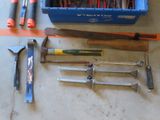 many tools that are laying out on the floor