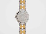 a close up of a watch on a white background