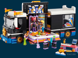 a toy truck that has a bunch of toys inside of it