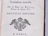 an old book with a picture of a bird on it ' s cover