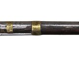 a large metal pipe with gold trims on it