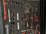 a tool case with tools in it on the floor