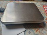 a laptop computer sitting on top of a piece of paper