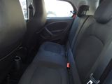 the back seat of a car with a seat belt in it