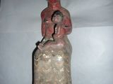 statue of a woman holding a baby in her arms