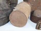 several old tins that are sitting on a table