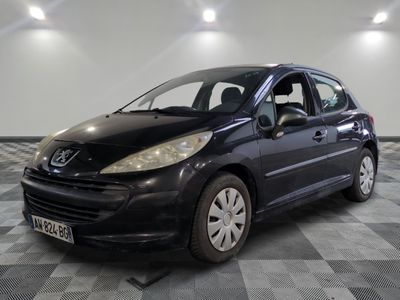 a picture of a black car parked in a garage