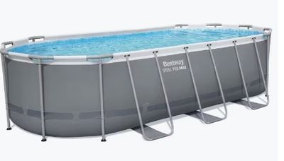 a large rectangular swimming pool with ladders on the side