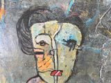 a painting of a woman with black hair on a wall