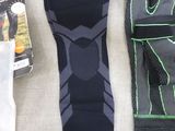 a pair of knee pads and a pair of knee pads on a couch