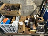 a cart full of assorted items on the street