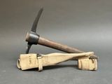 a hammer that is laying on top of a bag