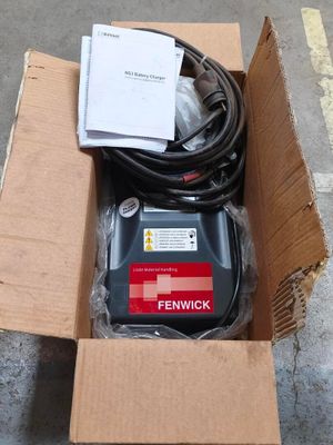 a box that has some wires in it on the ground