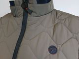 a close up of a jacket on a mannequin mannequin mannequin mannequin mannequin mannequin mannequin mann