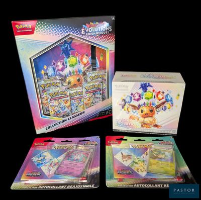 Trois cartes à collectionner Pokémon se trouvent dans une boîte sur fond noir