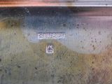a close up of a metal container with a label on it