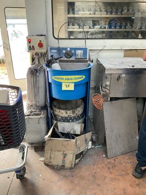 a man that is standing in front of a machine