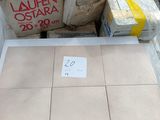 a pile of boxes sitting on a table with a price tag on it