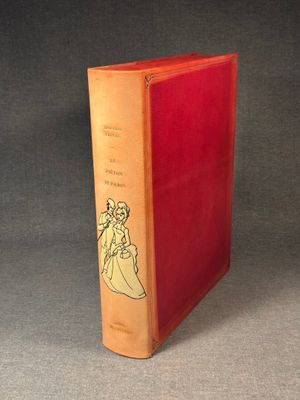 a red book with a drawing of a woman in a dress on it