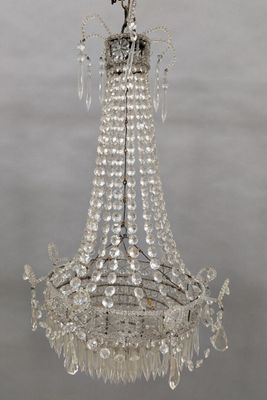 a close up of a crystal chandelier hanging from a ceiling