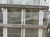 a pallet with a bunch of old windows on it