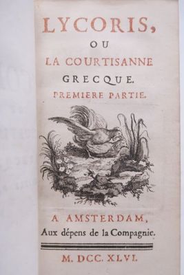 un vieux livre sur lequel figure l'image d'un oiseau dans un nid