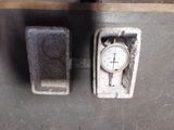 a clock that is on the side of a wall