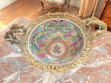 a bowl that is sitting on a table in a room
