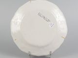 underside view of a plate showing the base of the bowl