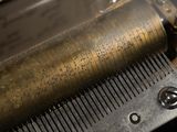 a close up of a musical box on a table