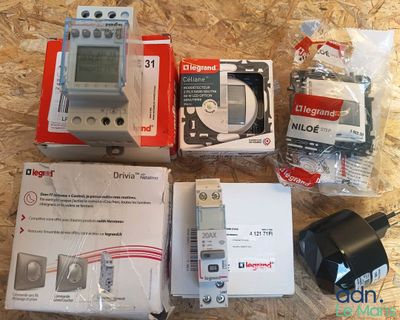 three electronic devices that are sitting on a table