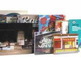 beaucoup de livres qui se trouvent sur l'étagère