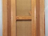 an image of a picture of a wooden frame with a picture on it