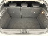 a trunk of a car with the back seats folded down