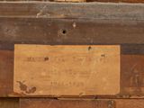a piece of wood that has a sign on it