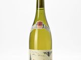 a bottle of wine that is sitting on a table