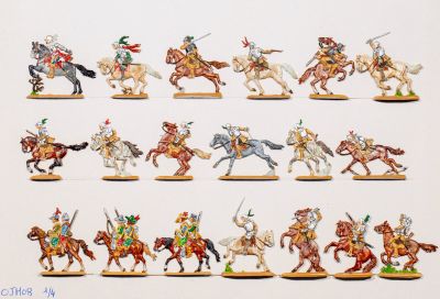 de nombreuses figurines représentant des hommes à cheval et des chevaux