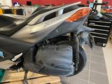 a motorcycle that is sitting on a pallet in a garage
