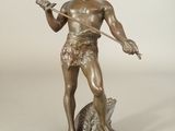 statue en bronze représentant un homme avec une épée et un chien