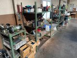 a room with a lot of boxes and tools on the shelves