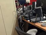 a desk with a computer and a monitor on it