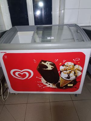 a large ice cream machine with a heart on it