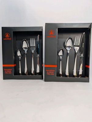 Lot de 2 ménagères 24 pièces de la marque Laguiole. - Photo 1