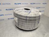 an image of a roll of cloth wrapped in plastic on top of a table