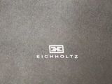 a black box with a white logo on it