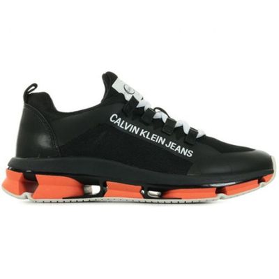 a picture of a black and orange sneaker with the words calvin klein jeans on it