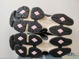 a close up of a pair of black and white shoes