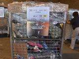 a metal cart with many items in it in a warehouse